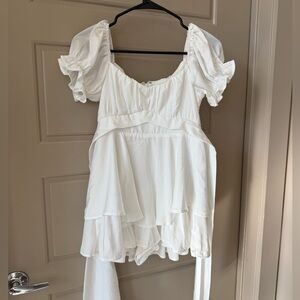 White ruffled romper-Francesca’s